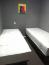 2 кровати 80х200, новые ортопедические матрасы в серой комнате. Можно использовать как двуспальную кровать 160х200